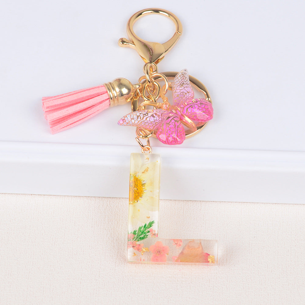卸売ドライフラワーレター樹脂キーホルダー